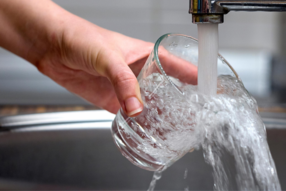 Running faucet and cup
